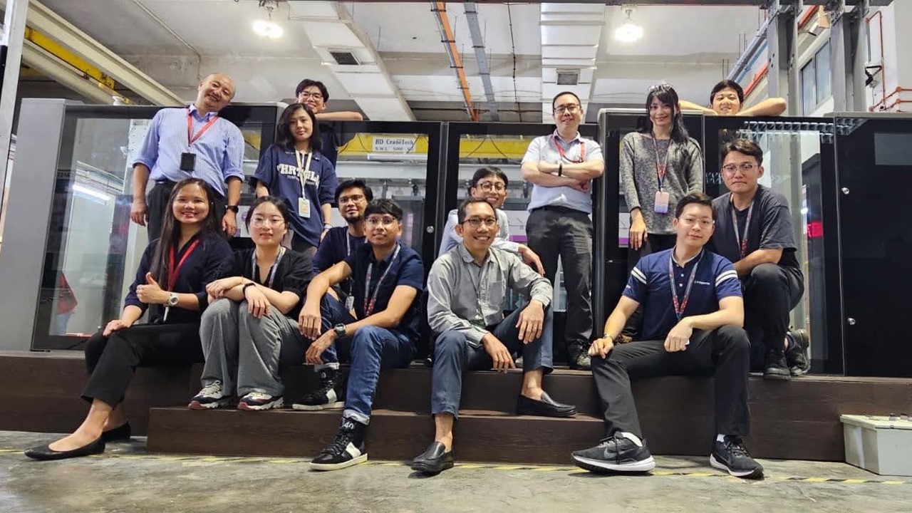 Joseph Selva Raj (foreground, third from left) with his AGIL Platform Screen Door team